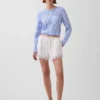 Pantalones cortos de talle medio de 4" con ribete de encaje y mezcla de lino