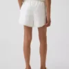 Pantalones cortos fáciles de poner para niños de lino y algodón con ribete de encaje