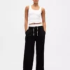 Pantalones de cintura media con doble cintura
