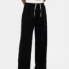 Pantalones de cintura media con doble cintura