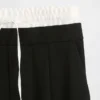 Pantalones de cintura media con doble cintura