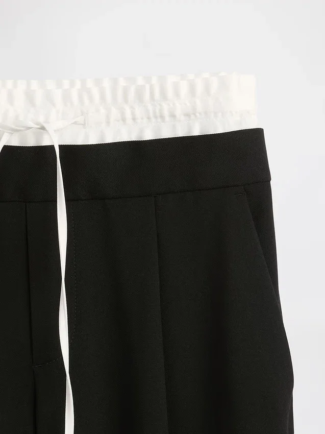 Pantalones de cintura media con doble cintura