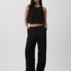 Pantalones de gasa de algodón con dobladillo abierto
