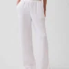 Pantalones de gasa de algodón con dobladillo abierto