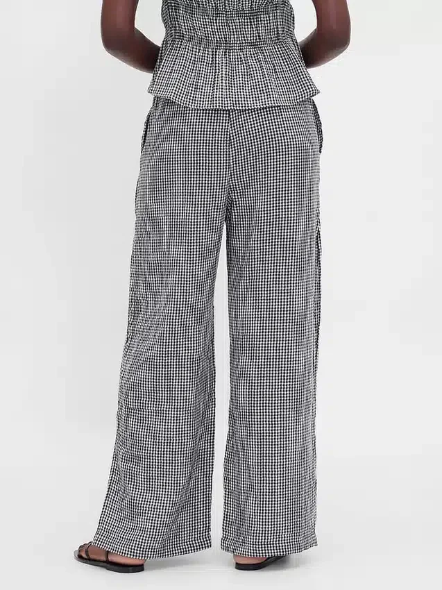 Pantalones de gasa de algodón con dobladillo abierto