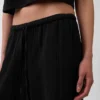 Pantalones de gasa de algodón con dobladillo abierto