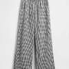 Pantalones de gasa de algodón con dobladillo abierto