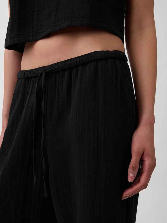 Pantalones de gasa de algodón con dobladillo abierto