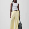 Pantalones de gasa de algodón con dobladillo abierto