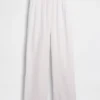 Pantalones de gasa de algodón con dobladillo abierto