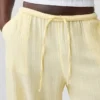 Pantalones de gasa de algodón con dobladillo abierto