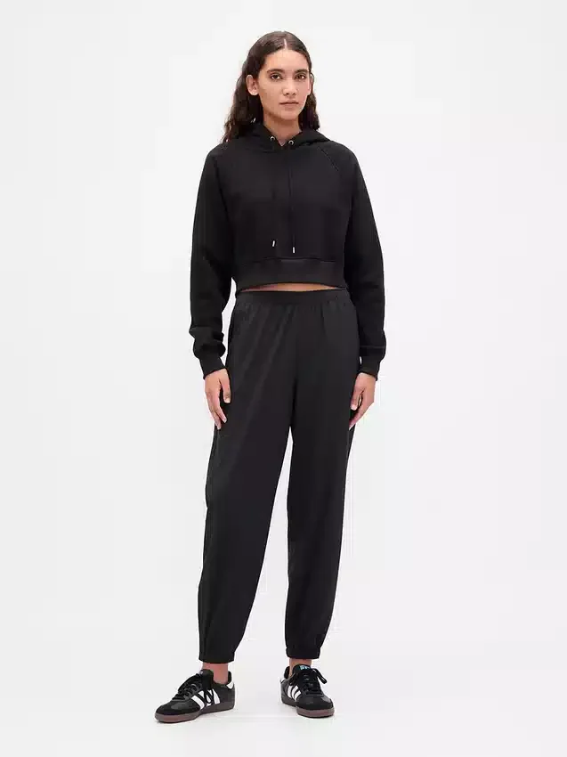 Pantalones de jogging GapFit Tech de talle alto con cremallera en el dobladillo
