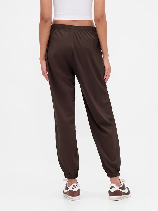 Pantalones de jogging GapFit Tech de talle alto con cremallera en el dobladillo