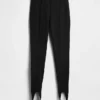 Pantalones de talle alto con estribos de doble tejido