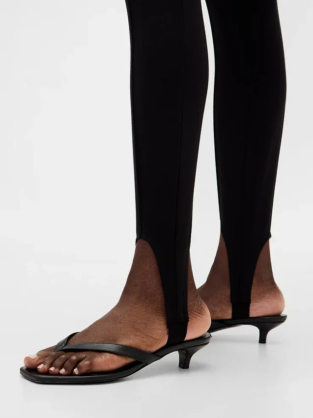 Pantalones de talle alto con estribos de doble tejido