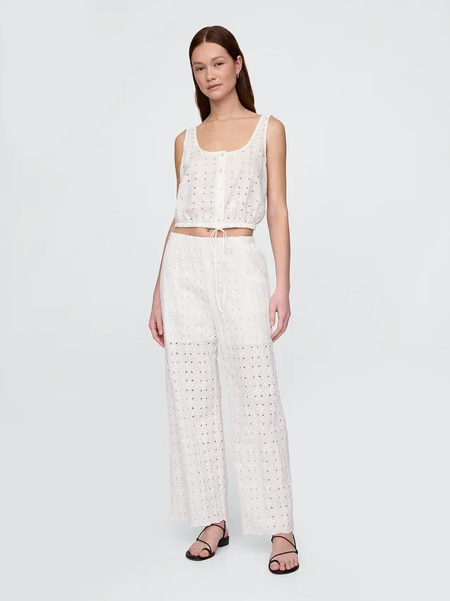 Pantalones de tiro medio con ojales y corte ancho