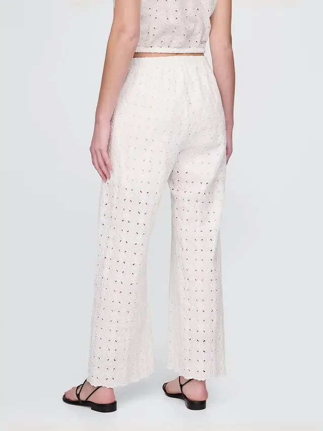 Pantalones de tiro medio con ojales y corte ancho