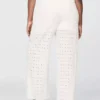 Pantalones de tiro medio con ojales y corte ancho