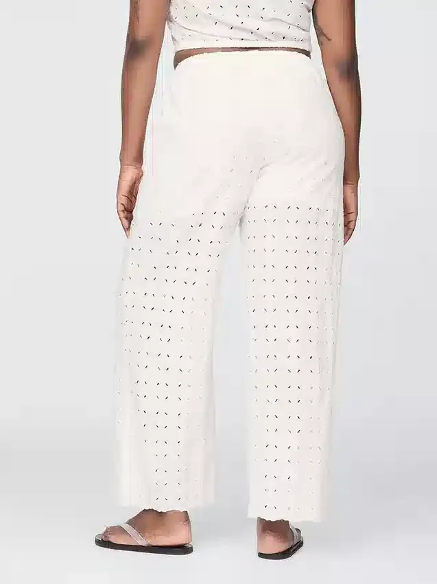 Pantalones de tiro medio con ojales y corte ancho