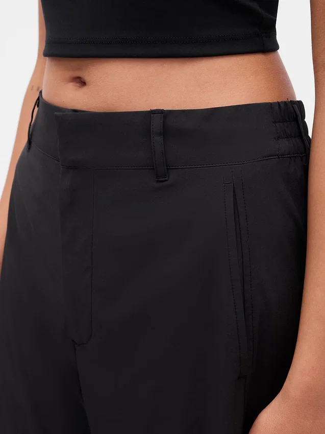 Pantalones GapFit Tech de talle alto y corte acampanado