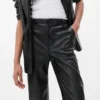 Pantalones holgados de cuero vegano de talle medio