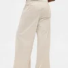 Pantalones holgados de pana de talle medio