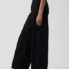 Pantalones holgados de popelín de talle medio y pierna ancha