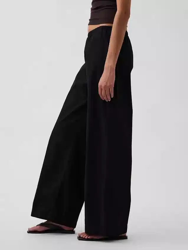Pantalones holgados de popelín de talle medio y pierna ancha