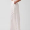 Pantalones holgados de popelín de talle medio y pierna ancha