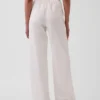Pantalones holgados de popelín de talle medio y pierna ancha