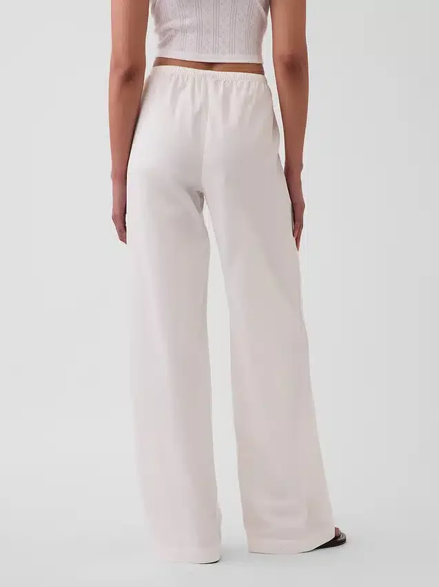 Pantalones holgados de popelín de talle medio y pierna ancha