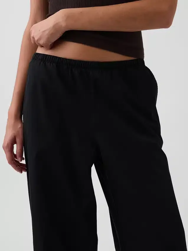 Pantalones holgados de popelín de talle medio y pierna ancha