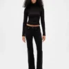 Pantalones largos y ajustados de pana de talle bajo