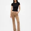 Pantalones largos y ajustados de pana de talle bajo
