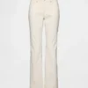 Pantalones largos y ajustados de pana de talle bajo