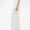 Pantalones plisados de talle alto con corte en arco de GAP × Victoria Beckham