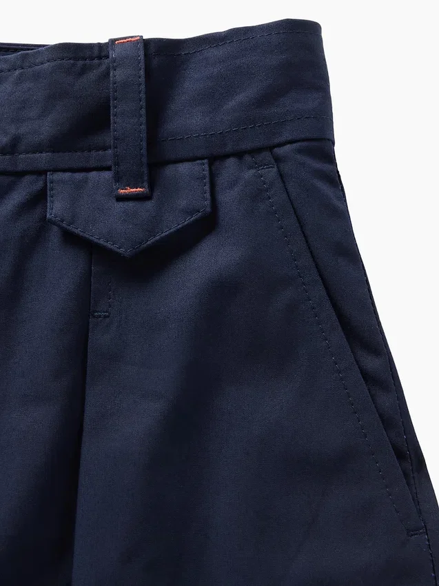 Pantalones plisados de talle alto con corte en arco de GAP × Victoria Beckham