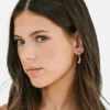 Pierced Co: Colgante de margarita para aretes tipo huggie