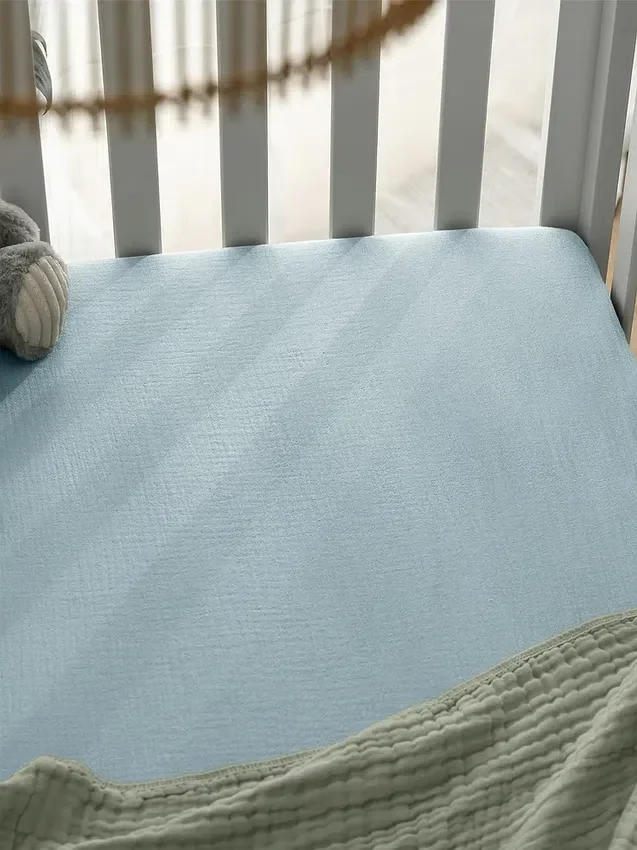 Sábana ajustable de muselina para cuna de Comfy Cubs