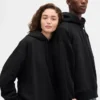Sudadera con capucha de viaje para adultos GAP × Béis, de tejido grueso