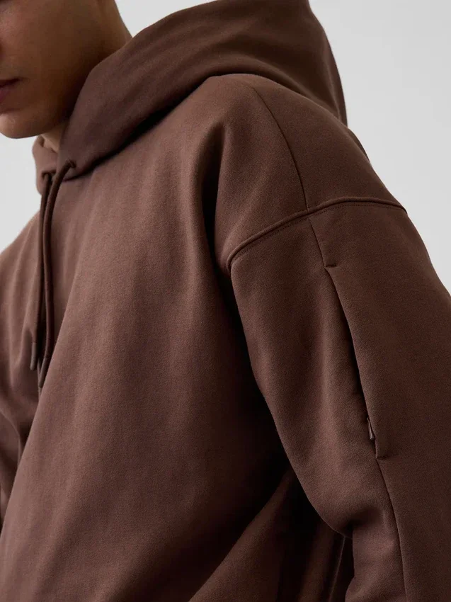Sudadera con capucha de viaje para adultos GAP × Béis, de tejido grueso