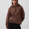 Sudadera con capucha de viaje para adultos GAP × Béis, de tejido grueso