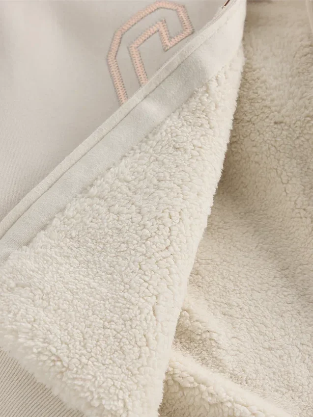 Sudadera con capucha para niños con logo gráfico y forro de sherpa