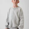Sudadera infantil Vintagesoft de corte holgado con cuello redondo y bolsillo