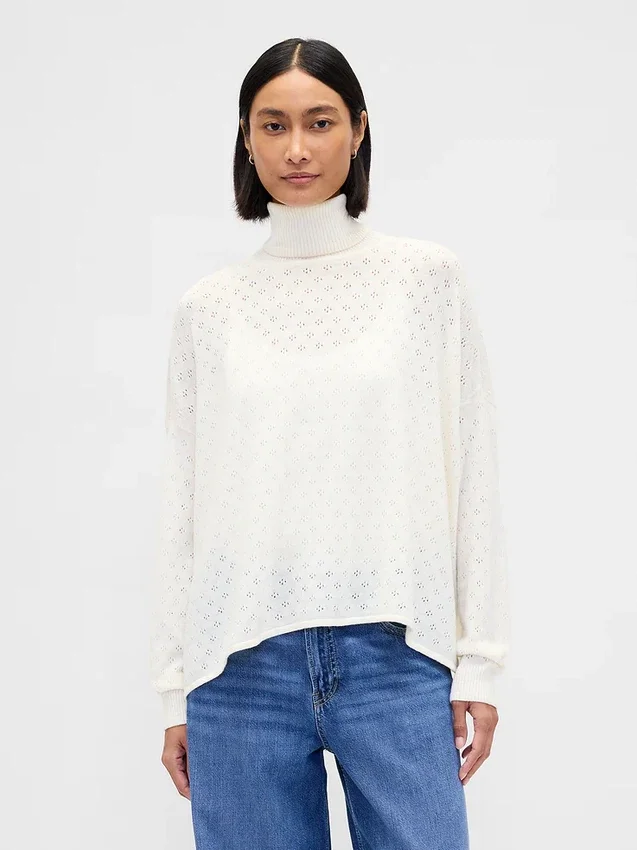 Suéter de cuello alto oversize con punto calado