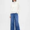 Suéter de cuello alto oversize con punto calado