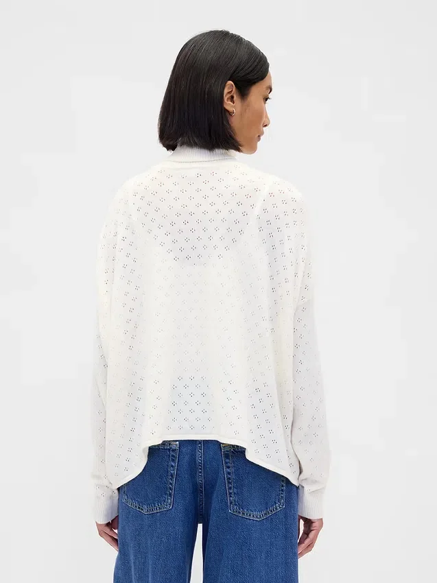 Suéter de cuello alto oversize con punto calado