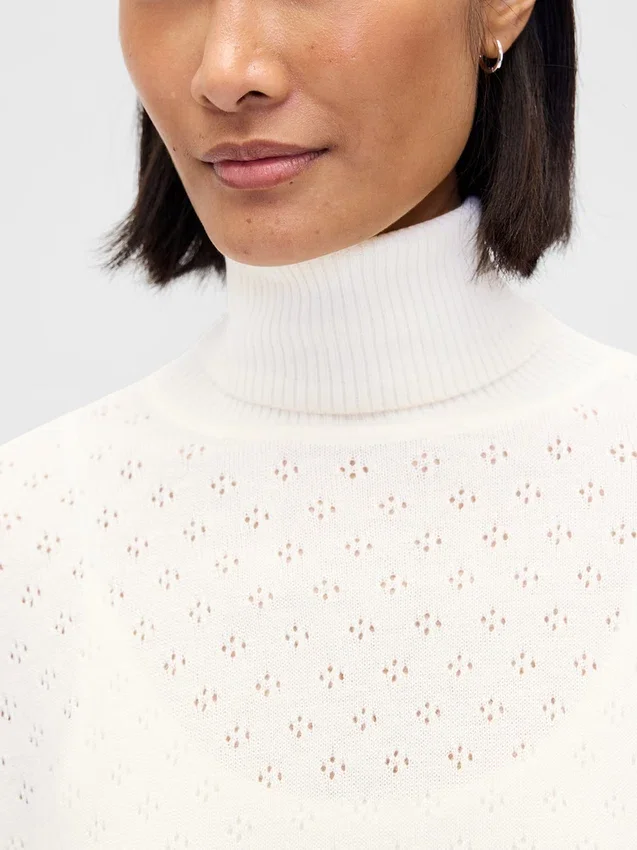 Suéter de cuello alto oversize con punto calado