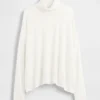 Suéter de cuello alto oversize con punto calado