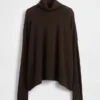 Suéter de cuello alto oversize con punto calado